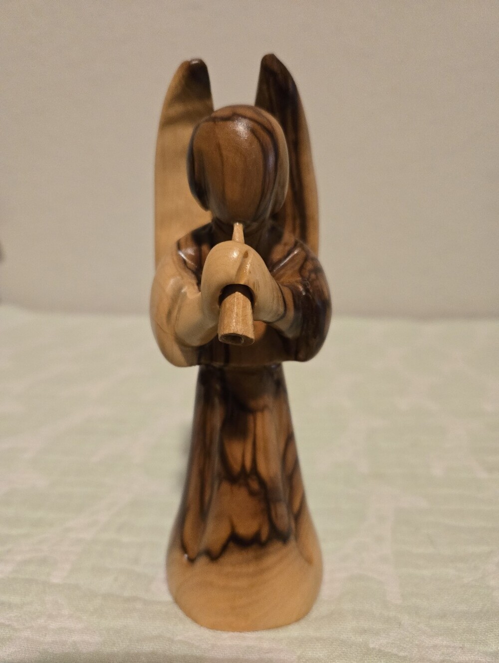 Beautiful Hand-Carved Olive Wood Angel Figurine Playing Flute.